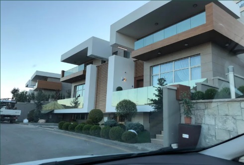 3D illustration mockup photo frame on the wall in living room, scandinavian style interior with cozy furniture and houseplant in natural decoration concept, rendering